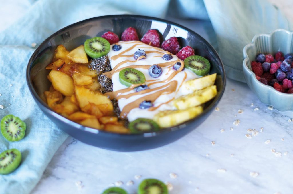 Delicious healthy breakfast bowl with fresh fruits and yogurt for a nutritious start.